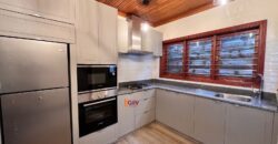 KYUNA; 2 Bedroom furnished cottage with a private outdoor space.